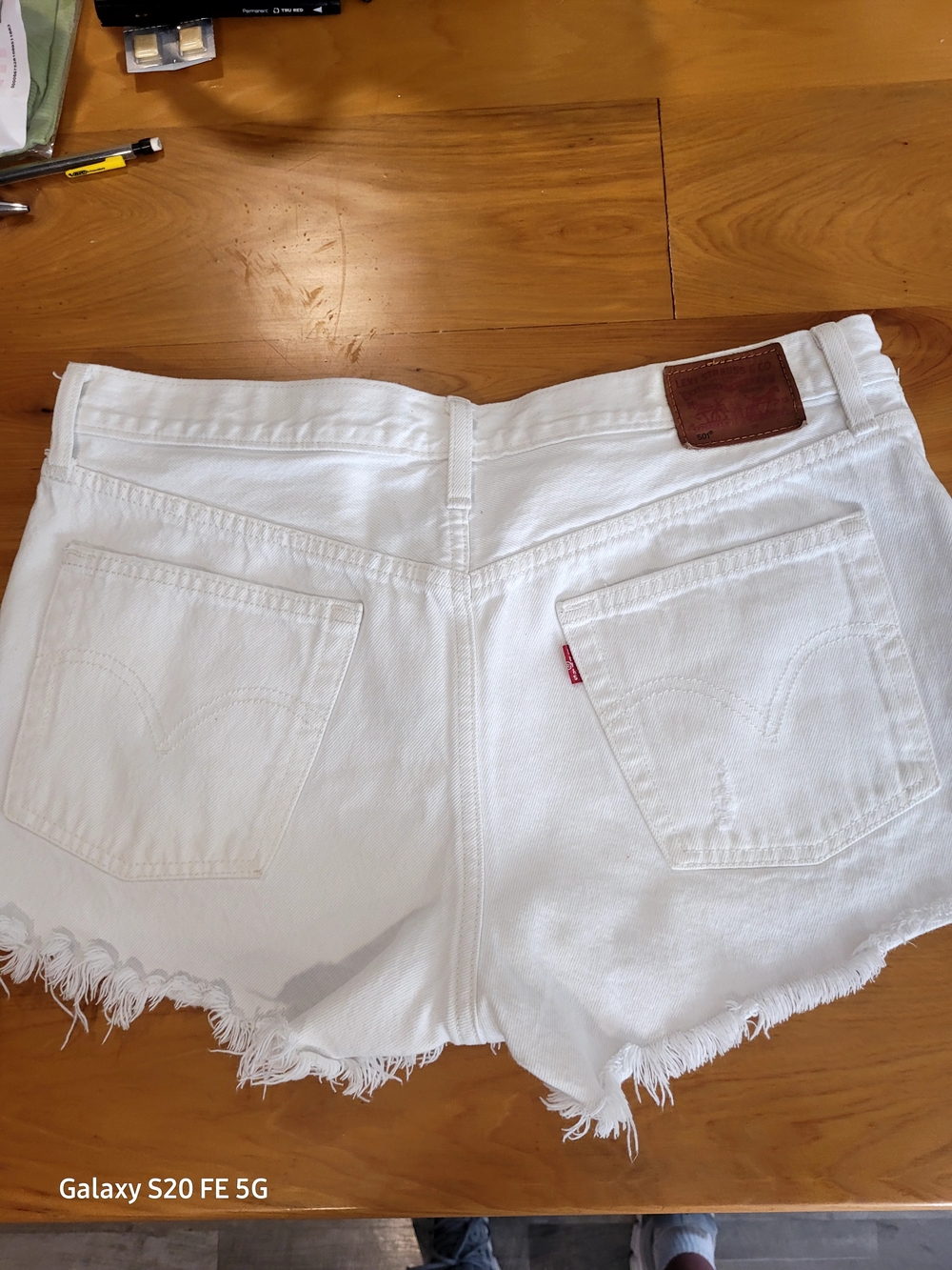 Levi's White Denim Frayed Hem Cutoff Shorts